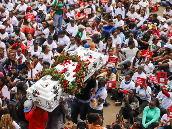 Demonstrators carried a coffin