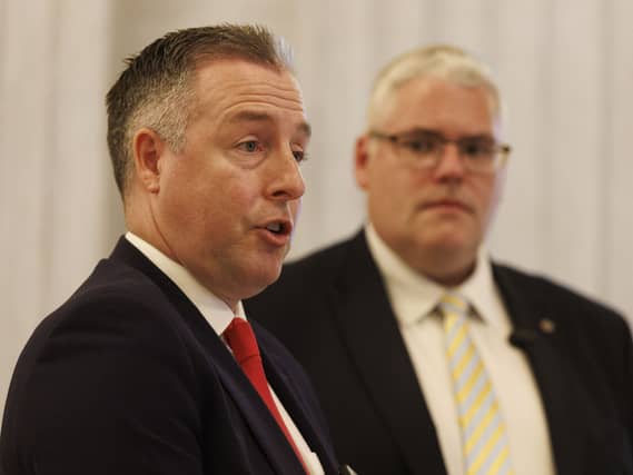 Education Minister Paul Givan and DUP leader Gavin Robinson MP speaking to the media about the proposed Education Inspections Bill in the Great Hall at Parliament Buildings, Stormont
