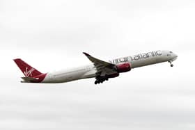 The plane carrying the England team takes off at Birmingham Airport