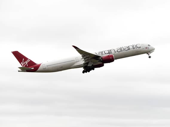 The plane carrying the England team takes off at Birmingham Airport