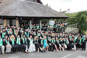 Apprentices with Cambrian Training Company’s managing director Faith O’Brien (seated centre) at the graduation ceremony.