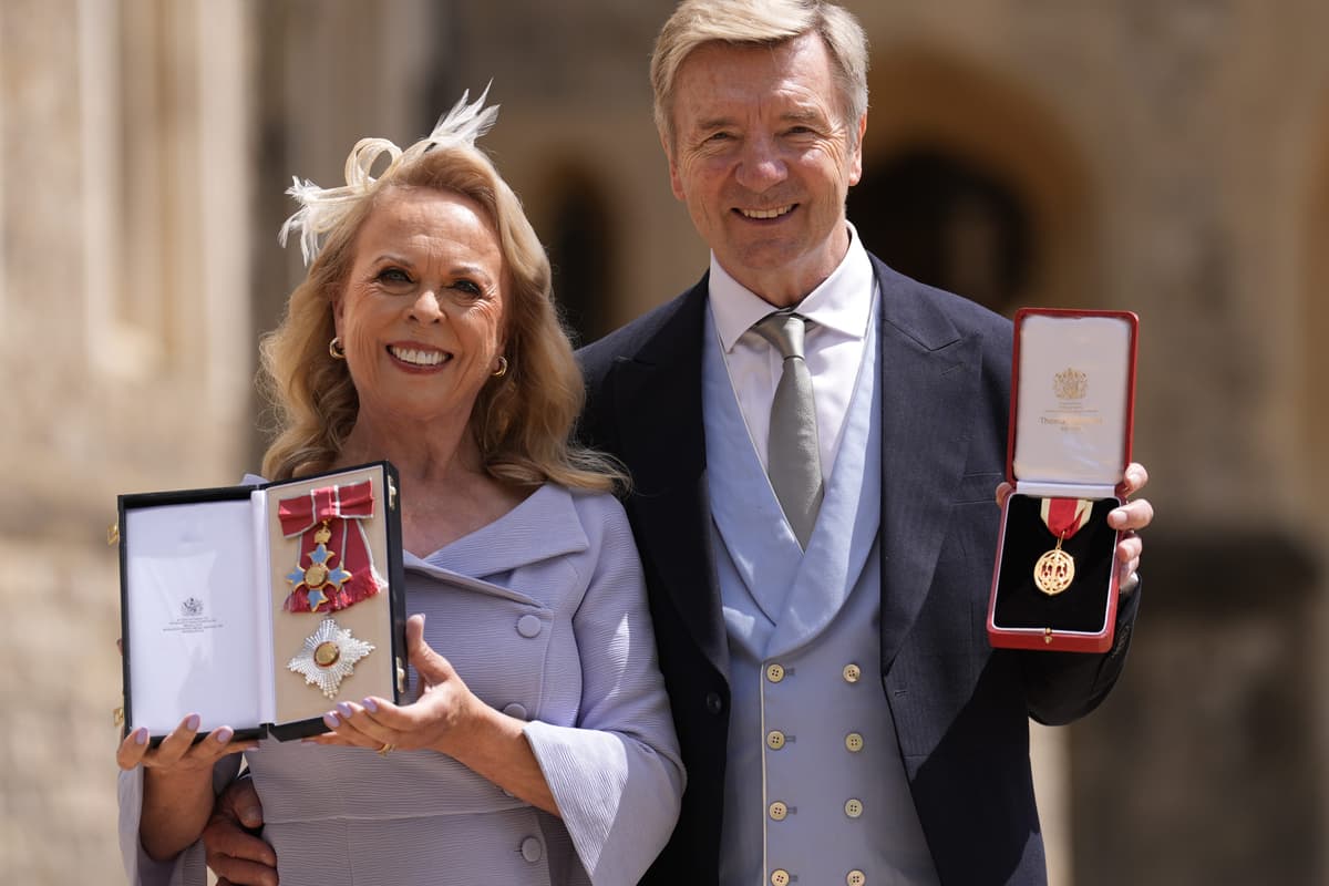 Torvill and Dean celebrate retirement with honours from King