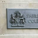 A sign for Edinburgh Sheriff Court