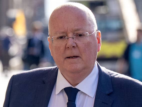 Headshot of Peter Murrell walking outside