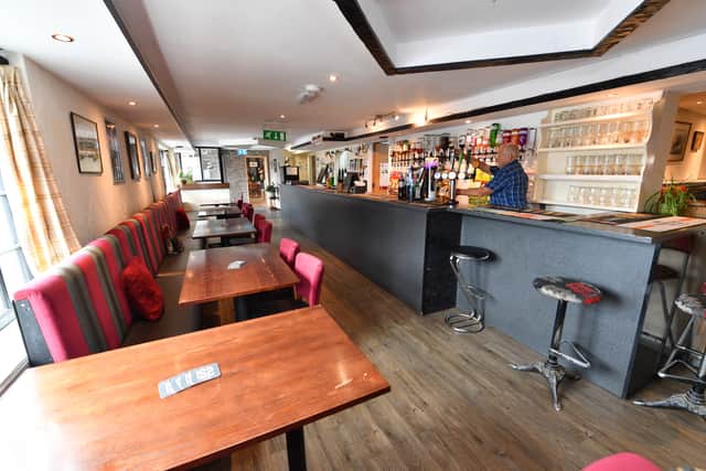 The bar stretches across most of the pub