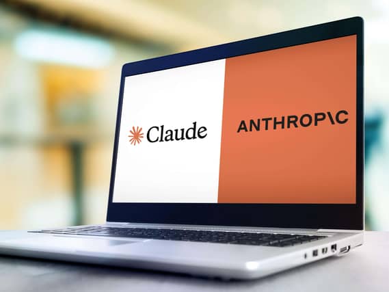 A laptop showing the Claude and anthropic logos