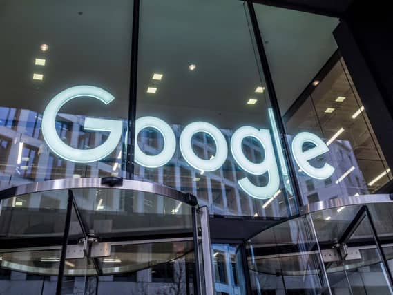 The Google logo displayed within an office building