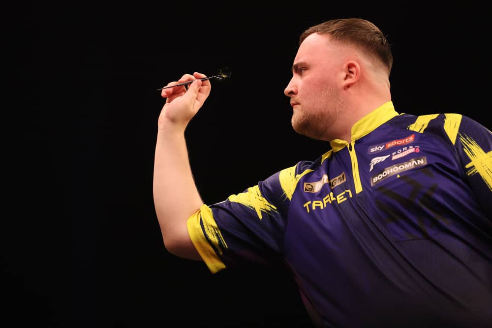 Luke Littler in darts action