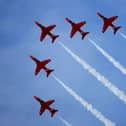 The Red Arrows go through one of their aerobatic displays at RAF Scampton on 12 November 12 2009.
