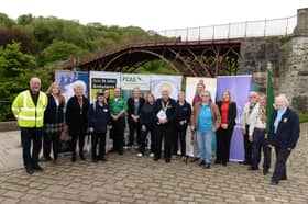 The presentation ceremony at the Iron Bridge.