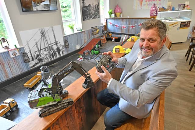 David Daly with a toy digger.