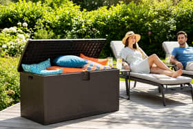 The large-capacity storage box is designed to keep outdoor essentials protected while helping patios stay clutter-free