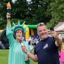 Last year’s carnival theme was landmarks and Sheila Thomas dressed as the Statue of Liberty. She was being interviewed by Jungle John.