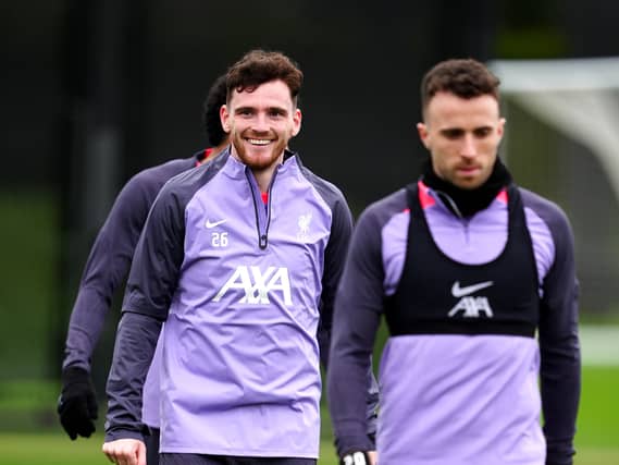 Andrew Robertson (left) and Diogo Jota