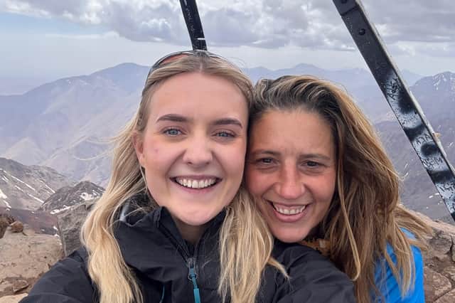 From left, hospice fundraiser Claire Penney and nurse Gemma Jones at the summit of Mt Toubkal.
