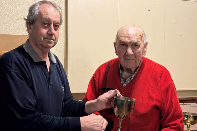 Keith Davies, of Beeches Bayston Hill, is presented with the Singles trophy by secretary Paul Thomas