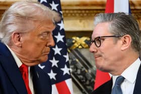 Donald Trump and Sir Keir Starmer look at each other during a press conference at Chequers