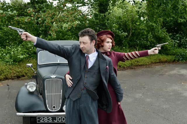 Bonnie and Clyde played by Dee Hallett and John Matts