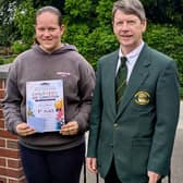 Livvy, 12, the competition winner with a member of Rhayader Male Voice Choir.