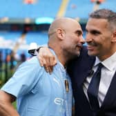 Manchester City manager Pep Guardiola (left) celebrating with club chairman Khaldoon Al Mubarak
