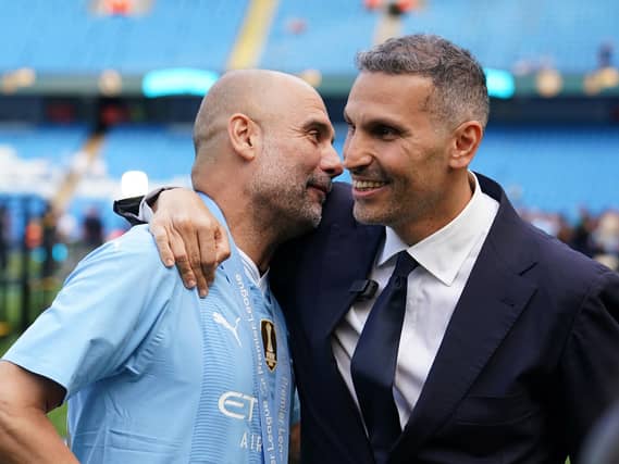 Manchester City manager Pep Guardiola (left) celebrating with club chairman Khaldoon Al Mubarak