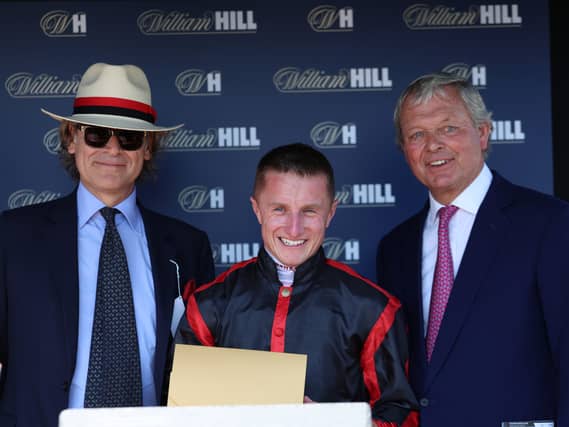 George Waud (left) with Tom Marquand and William Haggas at Lingfield