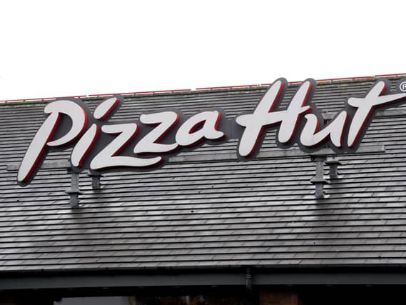 Pizza Hut sign on roof