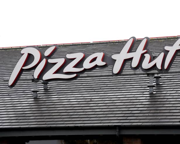 Pizza Hut sign on roof