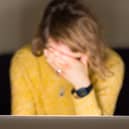 A woman looking stressed