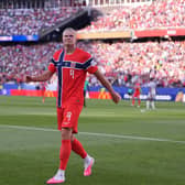 Erling Haaland celebrates after scoring his second goal against Iraq (Charles Krupa/AP)