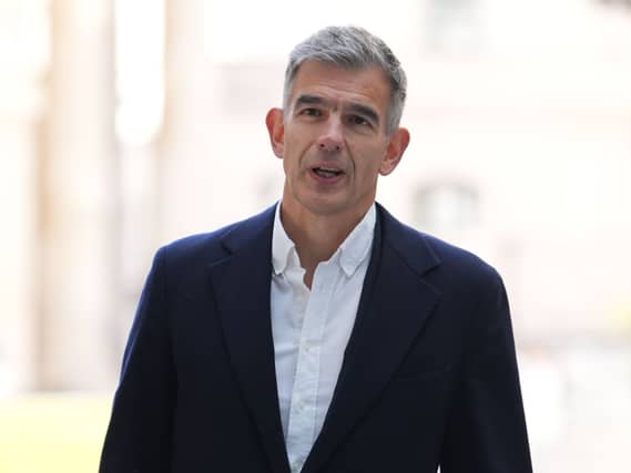 Matt Brittin speaking while walking out outside