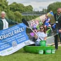 Organisers of the Coracle World Championships are urging people to get their entries in -  Jayney Davies from the Coracle Committee is flanked by Carole Green and John Harrison from Macmillan.