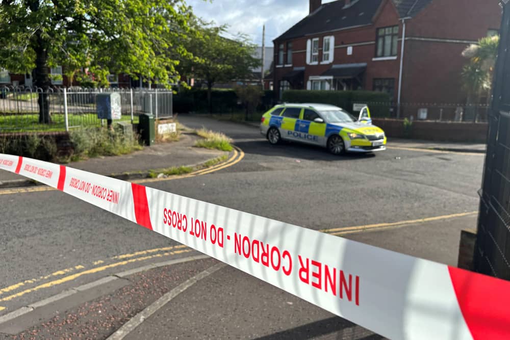 A police cordon at the scene of the stabbing outside apartments in the Kinnaird Avenue area of north Belfast