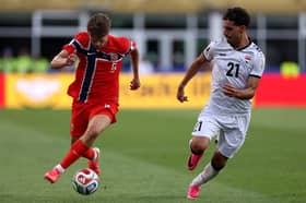 Wolves full-back David Moller Wolfe set-up Erling Haaland's opener for Norway.