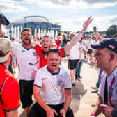 England fans celebrate victory at Texas Live! near the AT&T Stadium in Arlington, Texas