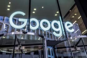 The Google logo displayed within an office building