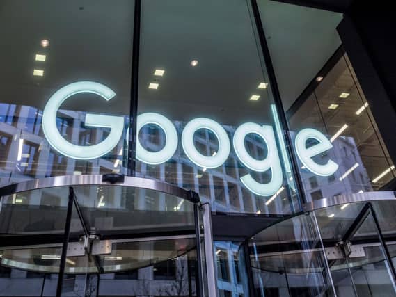 The Google logo displayed within an office building