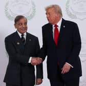 Pakistan Prime Minister Shehbaz Sharif (left) shakes hands with US President Donald Trump (PA Archive)