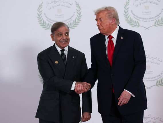 Pakistan Prime Minister Shehbaz Sharif (left) shakes hands with US President Donald Trump (PA Archive)