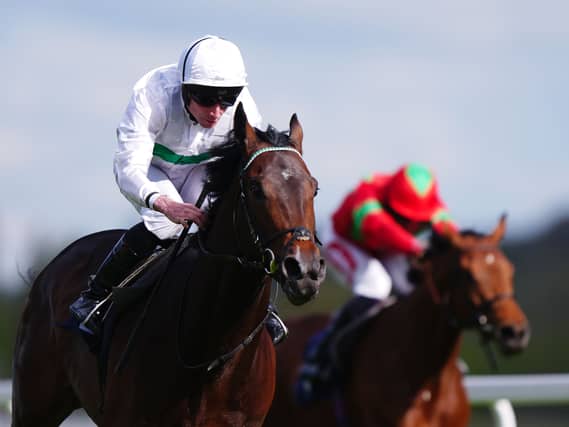 Water To Wine (left) in action at Newbury