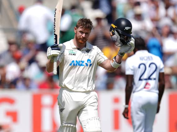 Glenn Phillips celebrates his century