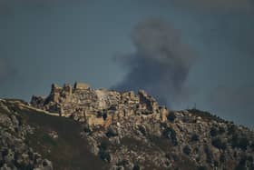 Smoke rises to the sky in an area behind Beaufort Castle following an Israeli military strike in southern Lebanon