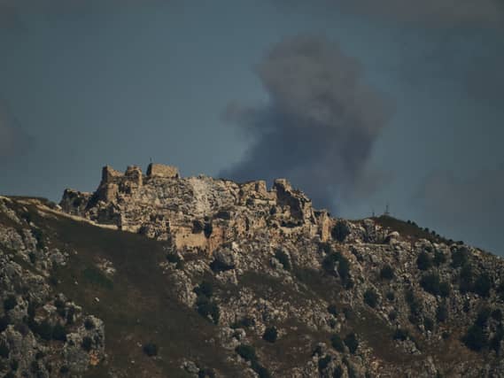 Smoke rises to the sky in an area behind Beaufort Castle following an Israeli military strike in southern Lebanon