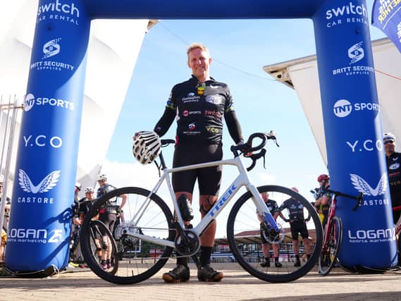 Lewis Moody with his bike before his seven-day cycle challenge
