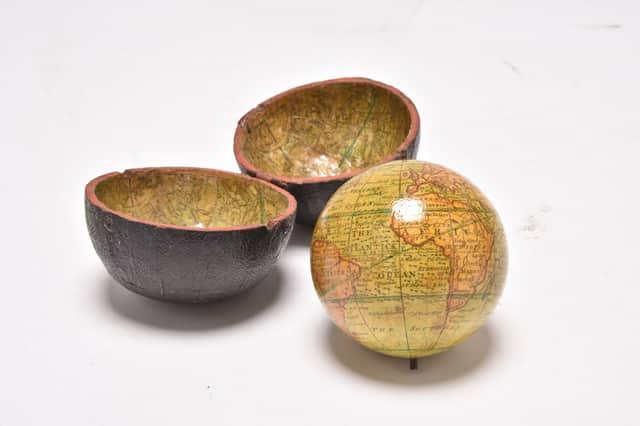 A George III, miniature terrestrial globe that sold for £1,800.