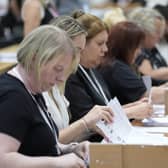 People counting the ballots