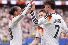 Germany’s Leroy Sane and Kai Havertz celebrate a goal against Curacao at the World Cup