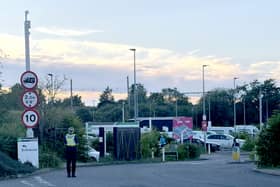 Police at Progress Park in Bedford, where families will pick up loved ones who were travelling on crashed trains