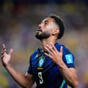Matheus Cunha celebrates after scoring Brazil’s opening goal (Petr David Josek/AP)