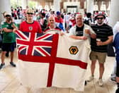 Gary Allen (2R) with son Cullen (R) at the England v Croatia match.  //  England fans who went to the 1986 World Cup and never came back were reunited in the USA at last night's game - with one even blagging his way into a Croatian VIP box.  Gary Allen, Stuart Bates, David Arnold and Garry Hardwicke jetted off to Mexico 40 years ago to follow the Three Lions while they were aged between 20 and 23.